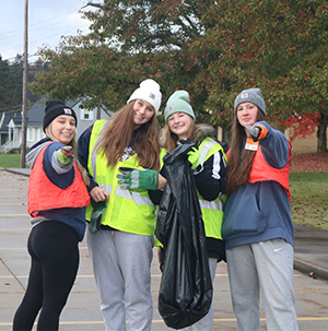 Group of high school girls doing community service