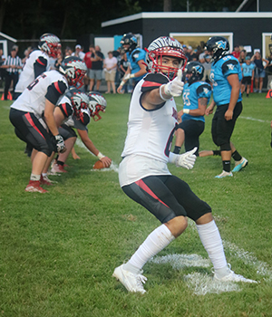 Football player giving thumbs up