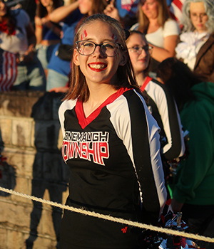 Spirited cheerleader smiling for the camera